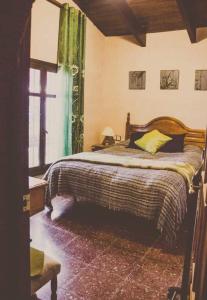 Postel nebo postele na pokoji v ubytování CORTIJO-LA LOMA