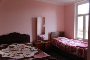 Letto o letti in una camera di Guest House Shota