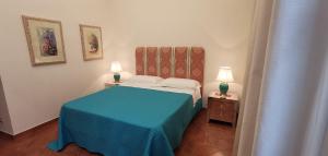 Postel nebo postele na pokoji v ubytování luxury Apartment Carmen n 2 Centro Storico di Taormina
