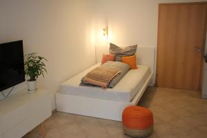 Tempat tidur dalam kamar di Ankommen und Wohlfühlen