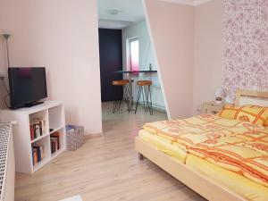 Postel nebo postele na pokoji v ubytování Ferienwohnung am Zeulenrodaer Meer