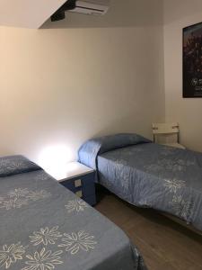 Posteľ alebo postele v izbe v ubytovaní Casa Tatiana