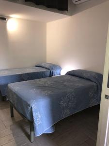 Posteľ alebo postele v izbe v ubytovaní Casa Tatiana