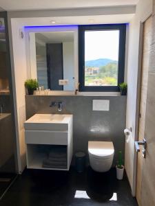 Koupelna v ubytování Appartement climatisé refait à neuf - VUE MER Saint-Tropez - Piscine- 50m plage