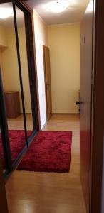 A bed or beds in a room at Penzion Montana