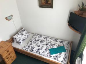 Postel nebo postele na pokoji v ubytování U Kapličky