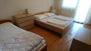 Posteľ alebo postele v izbe v ubytovaní Villa Palazzo Apartments + 32 fotografií