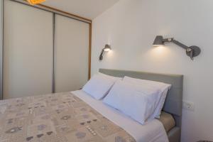 Postel nebo postele na pokoji v ubytování Casa Tonina
