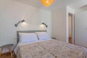 Postel nebo postele na pokoji v ubytování Casa Tonina