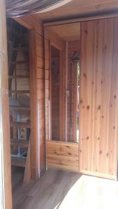 a wooden room with wooden walls and wooden floors at Sann/ Michaelis in Waren