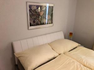 Voodi või voodid majutusasutuse SASS APARTHOTEL toas