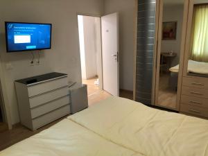 Voodi või voodid majutusasutuse SASS APARTHOTEL toas