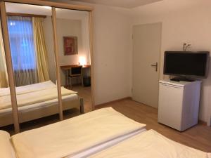 Voodi või voodid majutusasutuse SASS APARTHOTEL toas