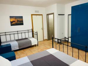 Postel nebo postele na pokoji v ubytování B&B Tramonti d'aMare