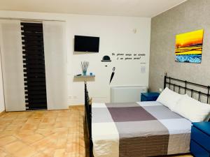 Postel nebo postele na pokoji v ubytování B&B Tramonti d'aMare