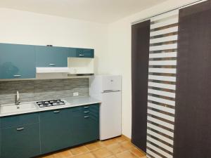 Kuchyň nebo kuchyňský kout v ubytování B&B Tramonti d'aMare