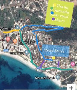 a map of a beach with a map at Stone House in Himare