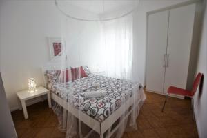 Posteľ alebo postele v izbe v ubytovaní GIULIA E CHIARA LUXURY APARTMENT