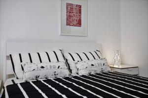 Posteľ alebo postele v izbe v ubytovaní GIULIA E CHIARA LUXURY APARTMENT
