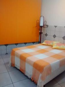 Voodi või voodid majutusasutuse Hospedagem Ilha Campeche toas