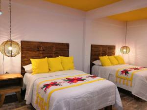 Кровать или кровати в номере Hotel Boutique Santa Lucía