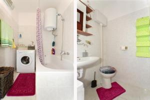 Kúpeľňa v ubytovaní Apartment with a sea view terrace, Čiovo near Trogir