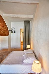 Krevet ili kreveti u jedinici u okviru objekta Casa de Veiros - Estremoz