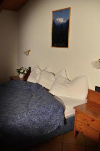 Кровать или кровати в номере Residence Bonetei