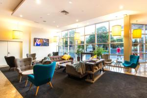 TV a/nebo společenská místnost v ubytování ibis Melbourne - Glen Waverley