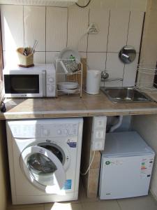 Kuchyň nebo kuchyňský kout v ubytování Varnaflats Guest Rooms