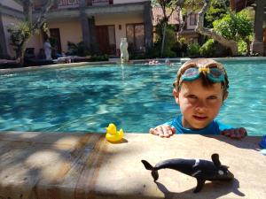 Bazén v ubytování Puri Mesari Hotel nebo v jeho okolí