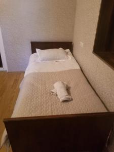 Postel nebo postele na pokoji v ubytování Guest House Shvelidze