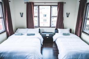 Cama o camas de una habitación en Hotel K2 Pokhara