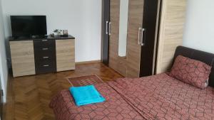 Ένα ή περισσότερα κρεβάτια σε δωμάτιο στο Apartament Lavinia