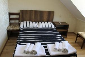 Postel nebo postele na pokoji v ubytování Hotel Lion