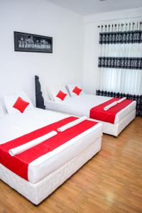Postel nebo postele na pokoji v ubytování Lion Resort
