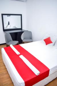 Postel nebo postele na pokoji v ubytování Lion Resort