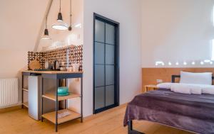 A bed or beds in a room at Kazbegi View