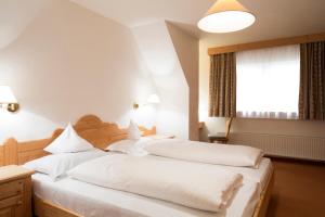 A bed or beds in a room at Residence La Selva