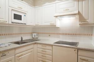 A kitchen or kitchenette at Residence La Selva