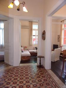 En eller flere senge i et værelse på Finestra Rossa old town vintage house