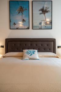 Postel nebo postele na pokoji v ubytování Corso Umberto Rooms