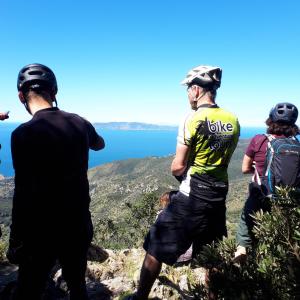 a group of people standing on top of a mountain at Bike&Boat Argentario Hotel in Porto Santo Stefano