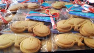 a bunch of cookies in plastic bags with bows at Bike&Boat Argentario Hotel in Porto Santo Stefano