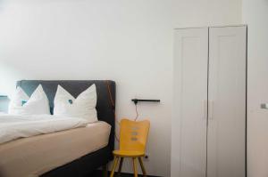 Voodi või voodid majutusasutuse BikeHikeSleep Apartments toas