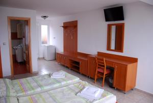 A bed or beds in a room at Rider Beach