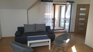 Posedenie v ubytovaní Apartamenty Kapitanskie