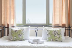 Postel nebo postele na pokoji v ubytování Hotel Marathia