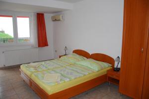 A bed or beds in a room at Rider Beach