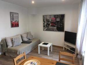 TV a/nebo společenská místnost v ubytování Belapparthotel Arras